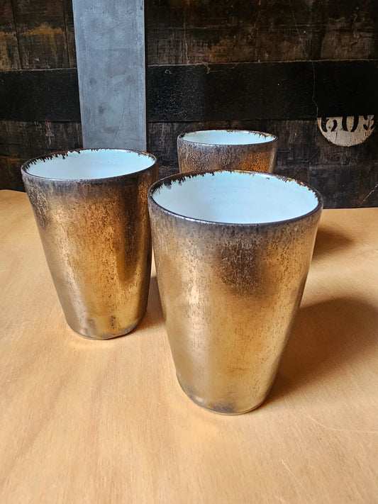 Gold Tumblers by Alex Linden